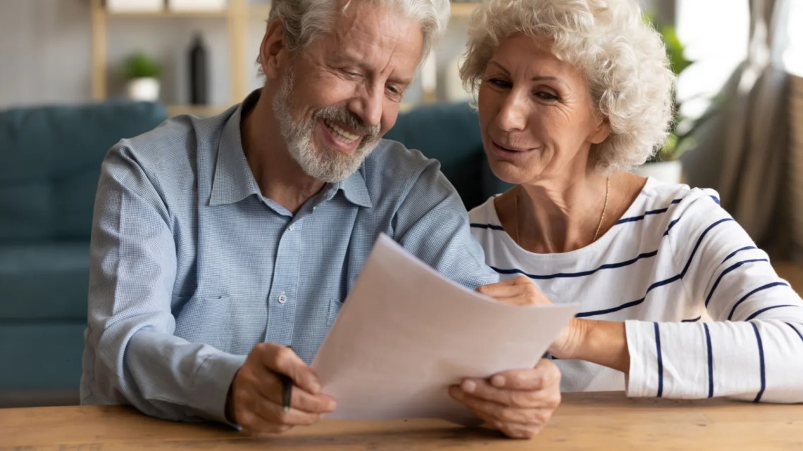 An older couple going over taxes together.