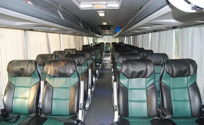 Comfortable economy coach seating for group trips in Doha