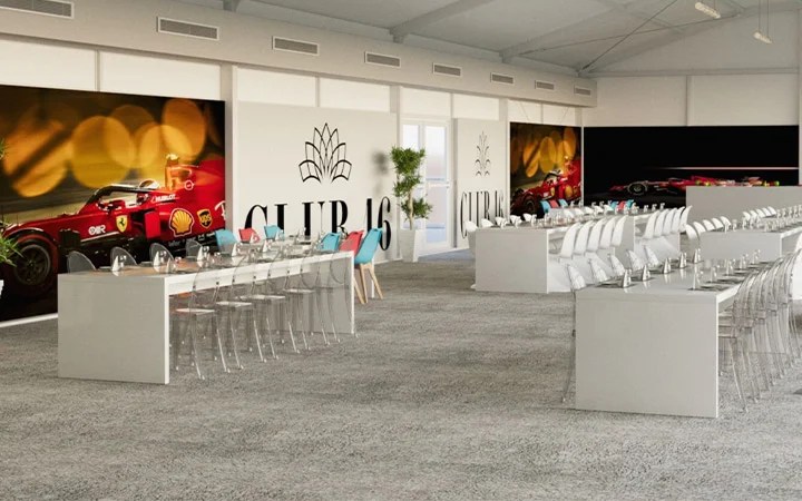 Branded event space at Club 16 with Ferrari wall art and seating Doha