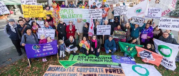 Protesters against anti democratic corporate power
