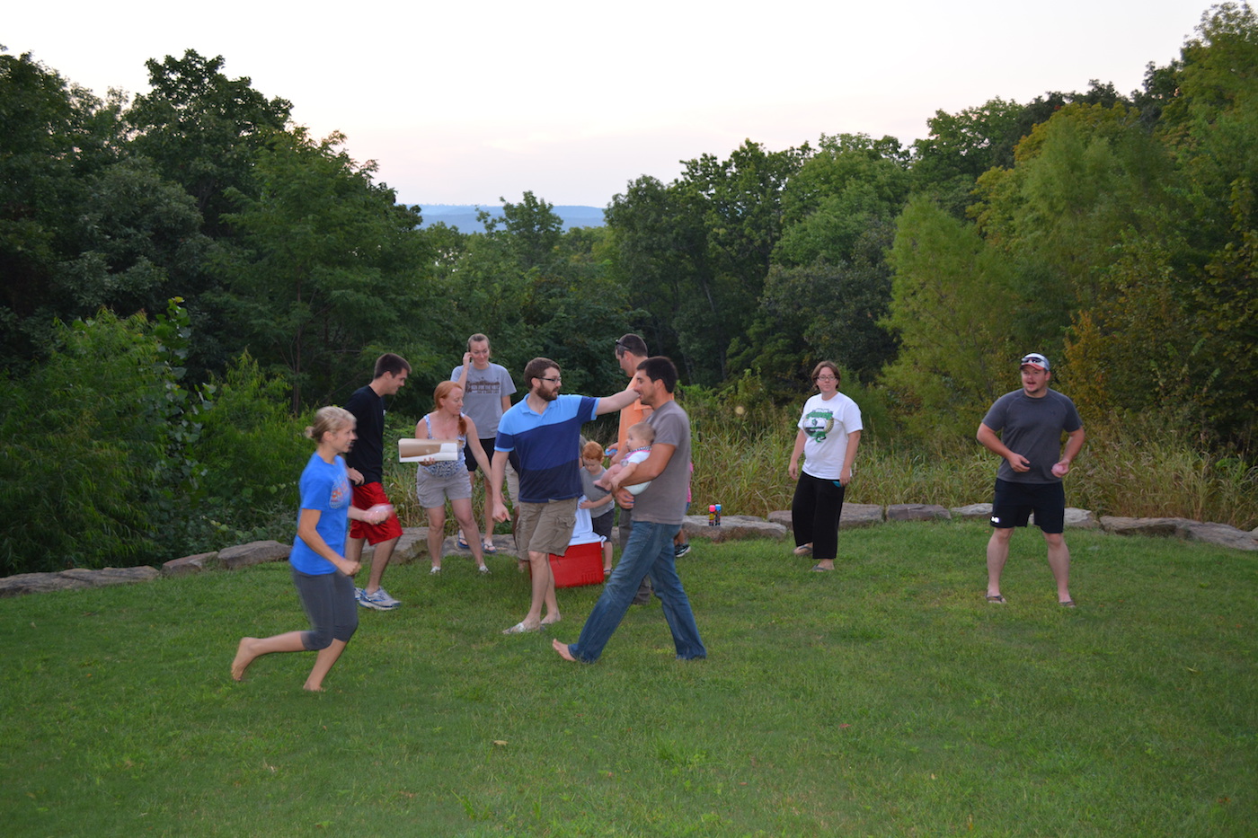 Group of friends preparing for gender reveal party.