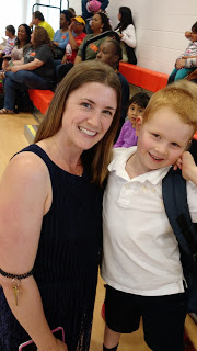 Pre-K student with teacher.