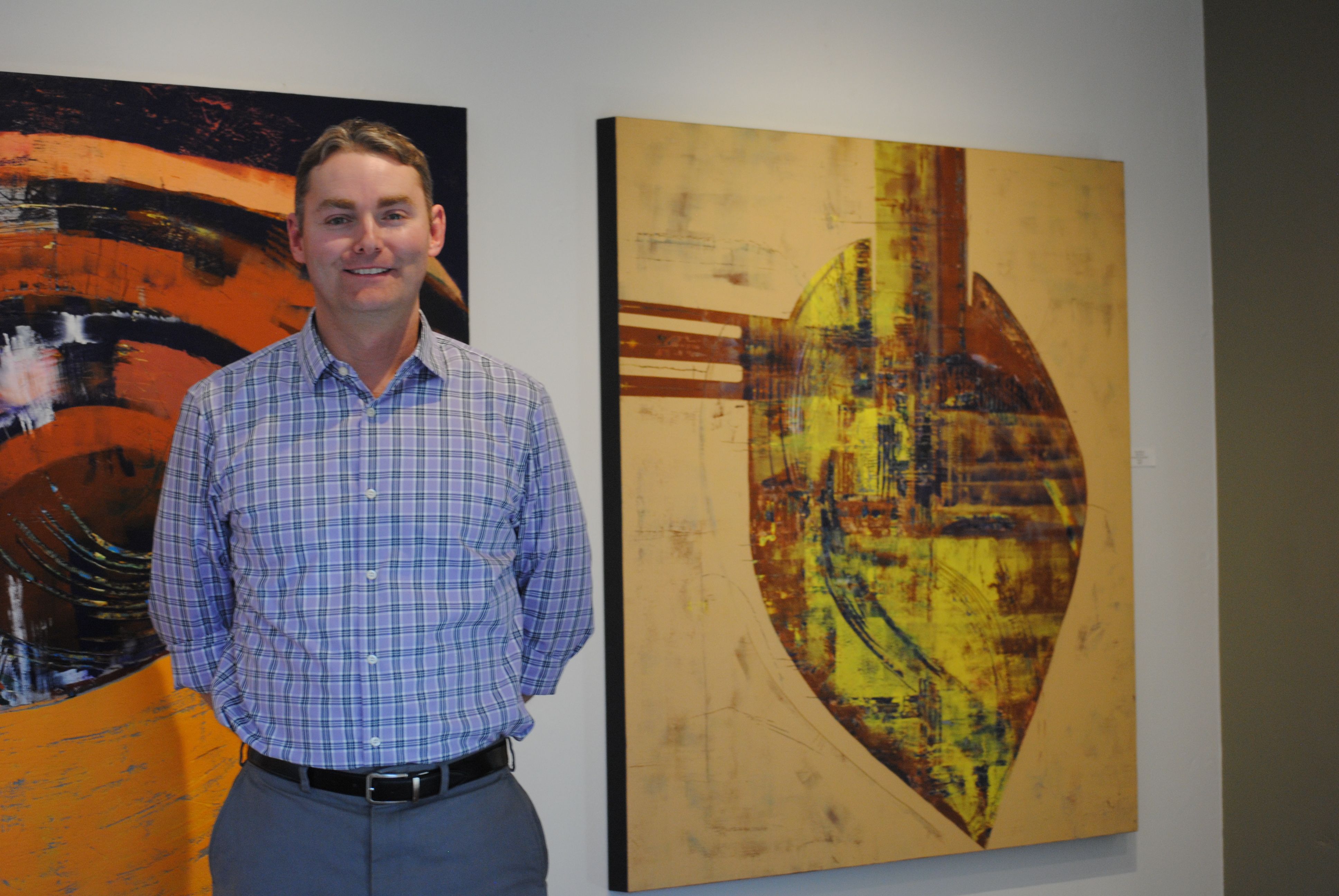 David Oklahoma, showing at Tilt Gallery, has an interesting technique using printer's ink instead of paint, and scraping away the ink to reveal the multitude of colors that he has laid down.