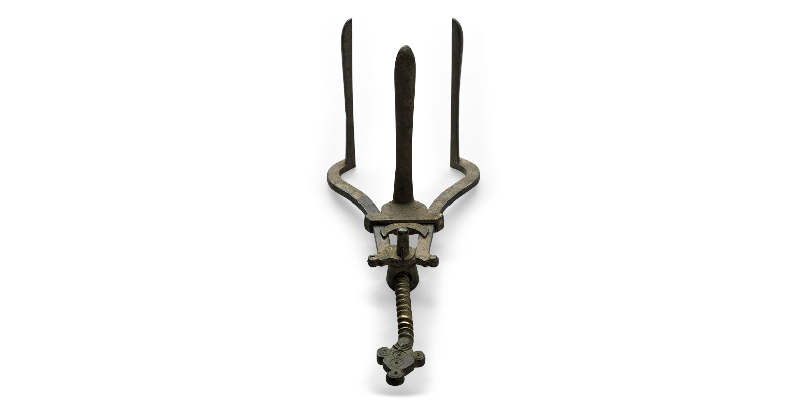 A horseshoe-shaped metal tool with a long threaded rod extending outward. Three other rods protrude upward from the horseshoe-shaped portion.