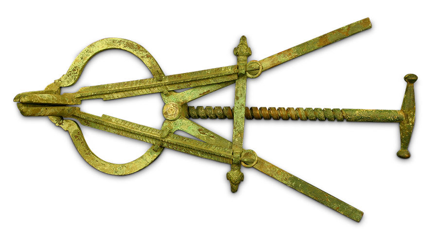 A greenish-yellow scissor-like tool on a black background. 