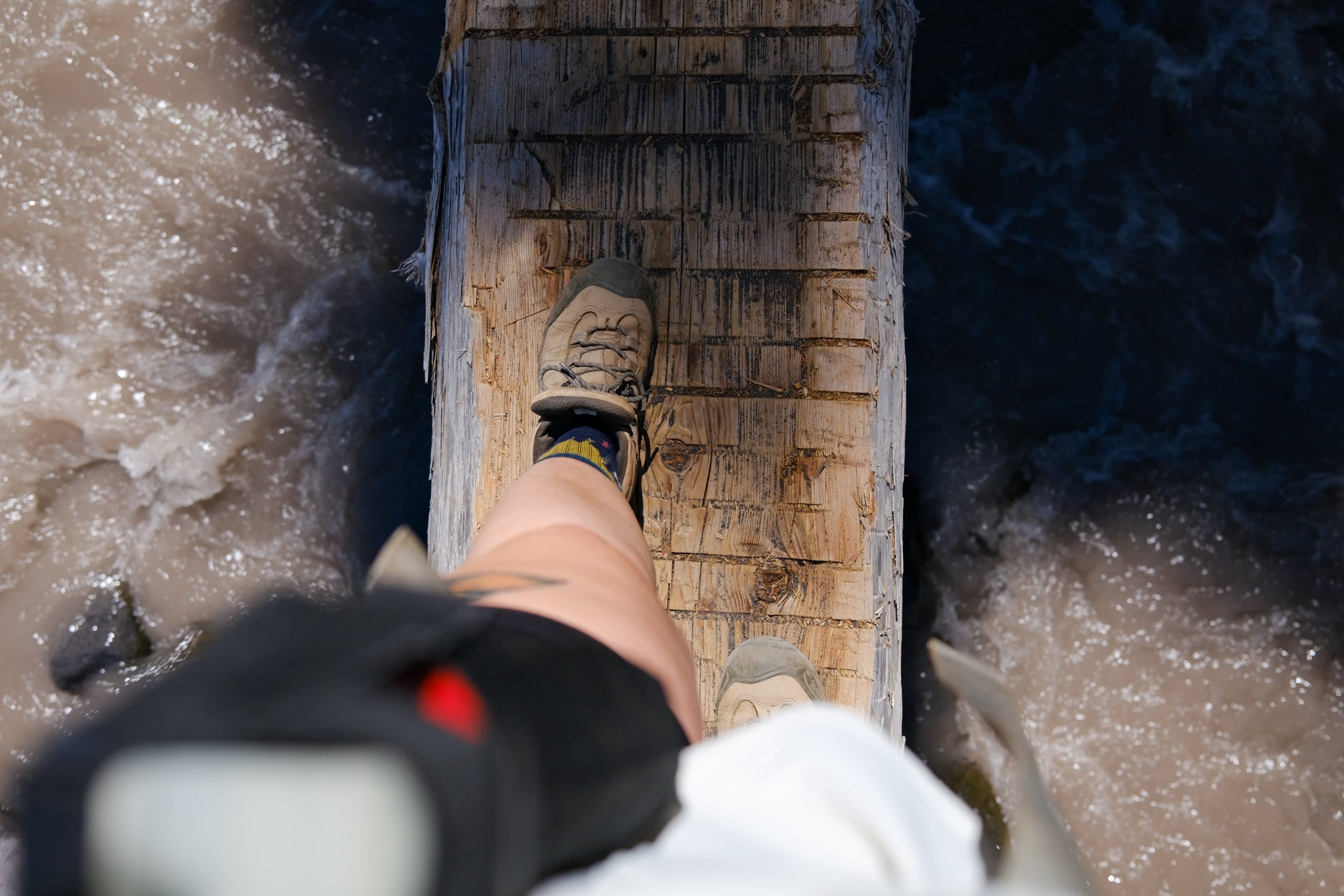 Crossing a footbridge over the carbon river