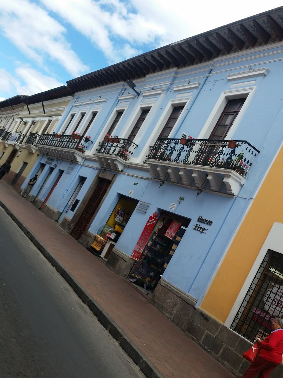 Blue building with balconies in Quito.