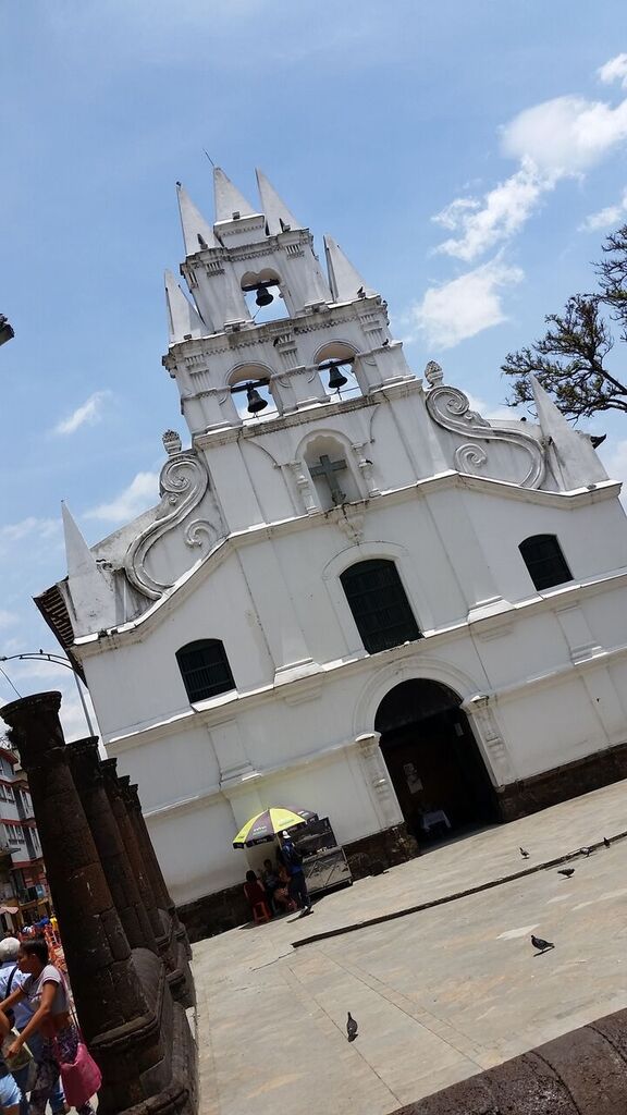 The white Veracruz Church in Medellin