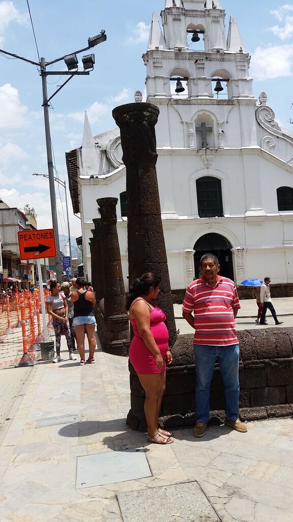 People outside the Veracruz Church in Medellin