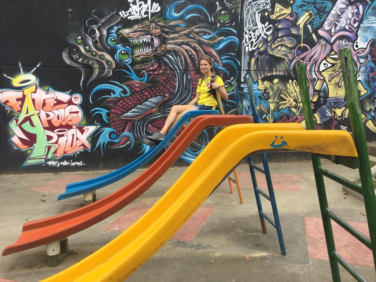 Sitting on a slide in Comuna 13 in Medellín Colombia