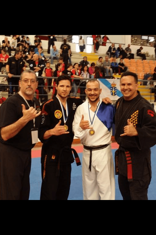 ETRP's Founder Lucas Sullivan is celebrating his 1st place win. with Prof. Tim & Olohe Kai