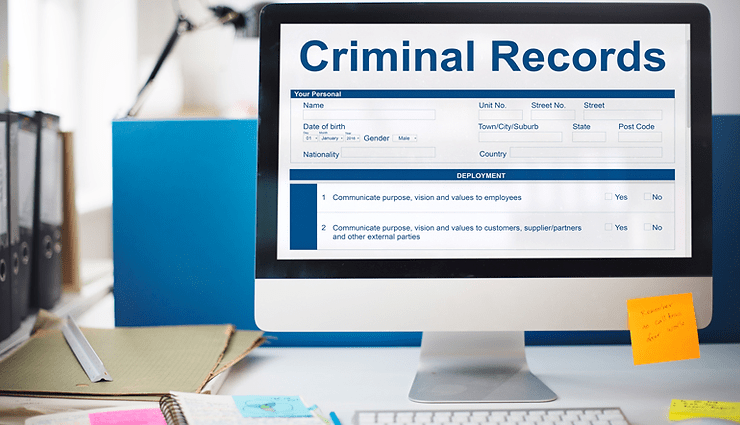 Computer screen displaying a "Criminal Records" form with personal information fields, relevant to discussions about DWI implications for travel to Canada.