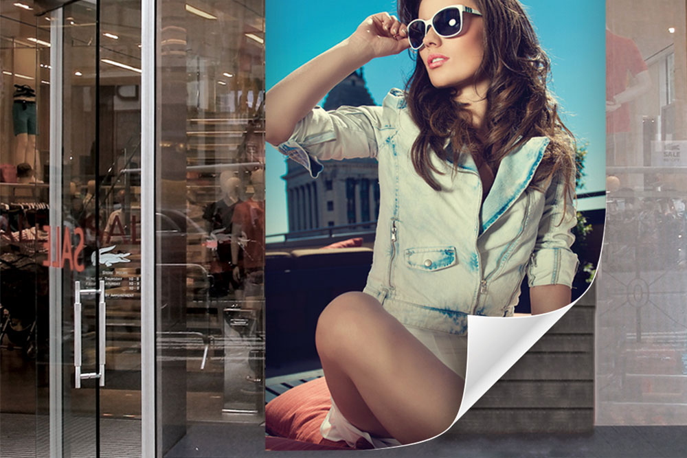 Adhesive vinyl window application outdoor installation repositionable removable wall application visuals graphic design advertising marketing visual display retail