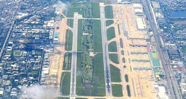 Golf Course Amidst Bangkok Runways
