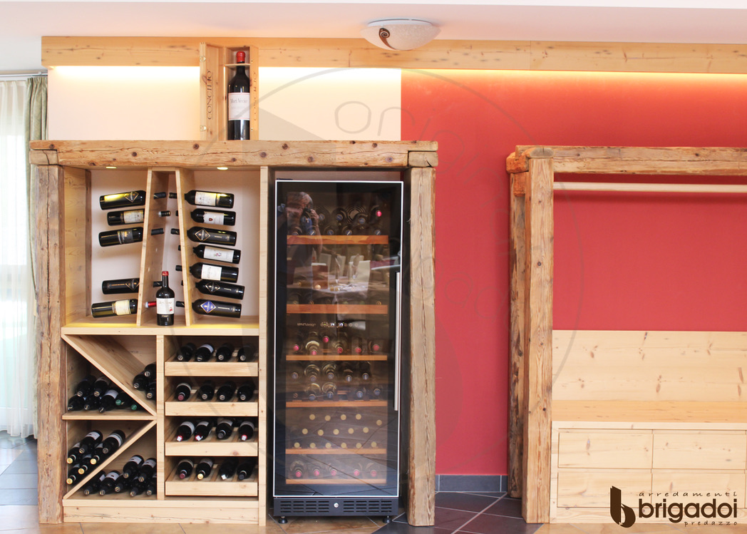ARREDO VINO HOTEL SALA PRANZO ARREDAMENTO FALEGNAMERIA BRIGADOI VAL DI FIEMME LEGNO TRENTINO DESIGN DOLOMITI
