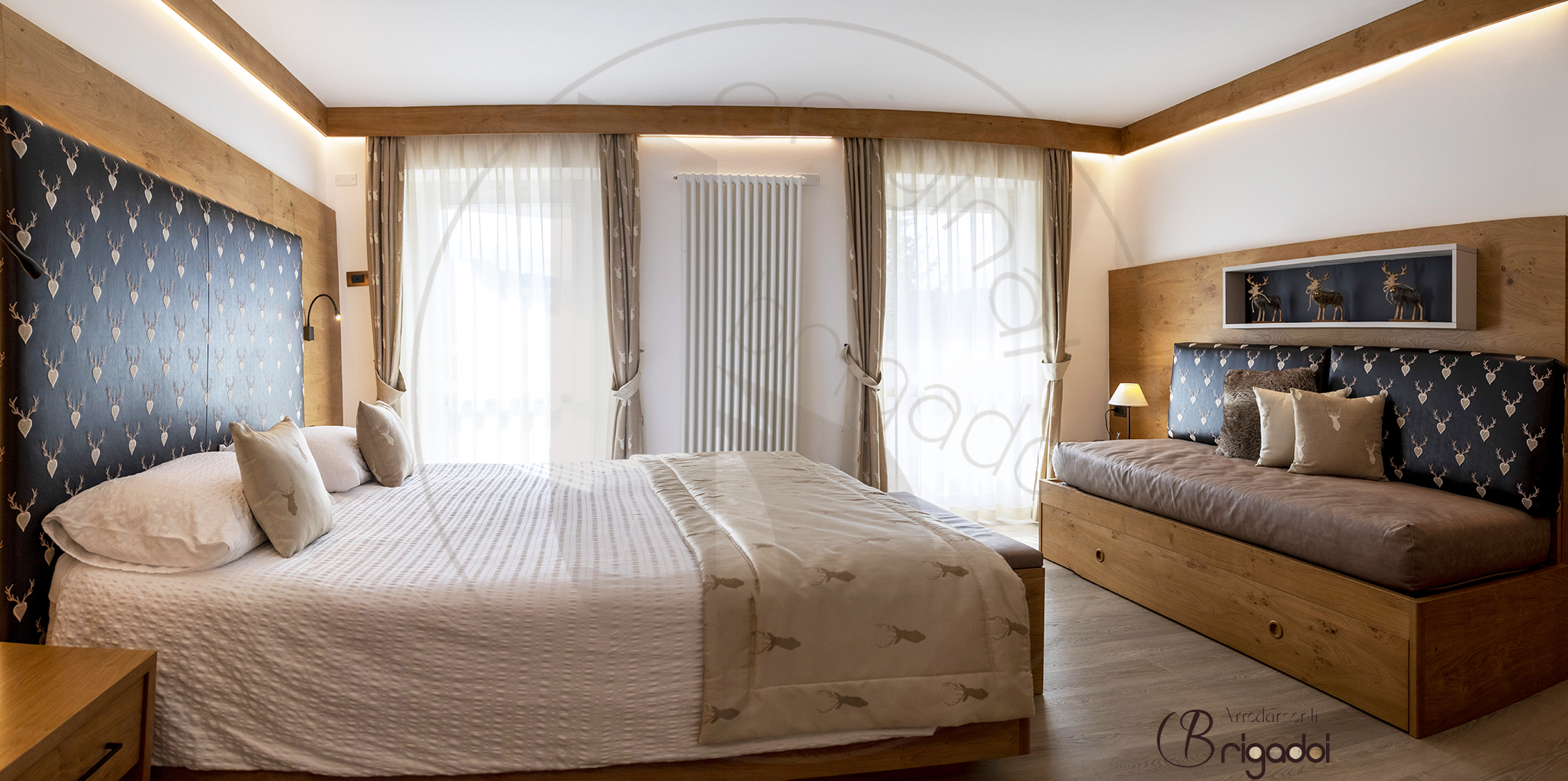 suite cervi dolomiti arredamenti falegnameria brigadoi mountaindesign interiordesign val di fiemme hotel deluxe legno trentino dolomiti