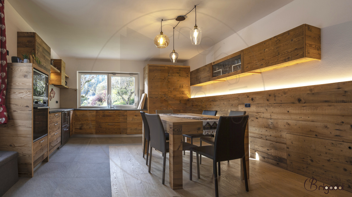 casa legno val di fiemme trentino interior design arredamento falegnameria soggiorno cucina dolomiti