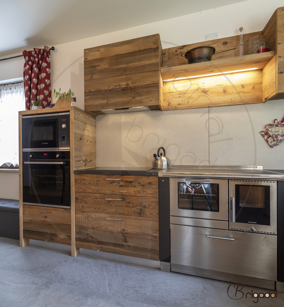 casa legno val di fiemme trentino interior design arredamento falegnameria soggiorno cucina dolomiti