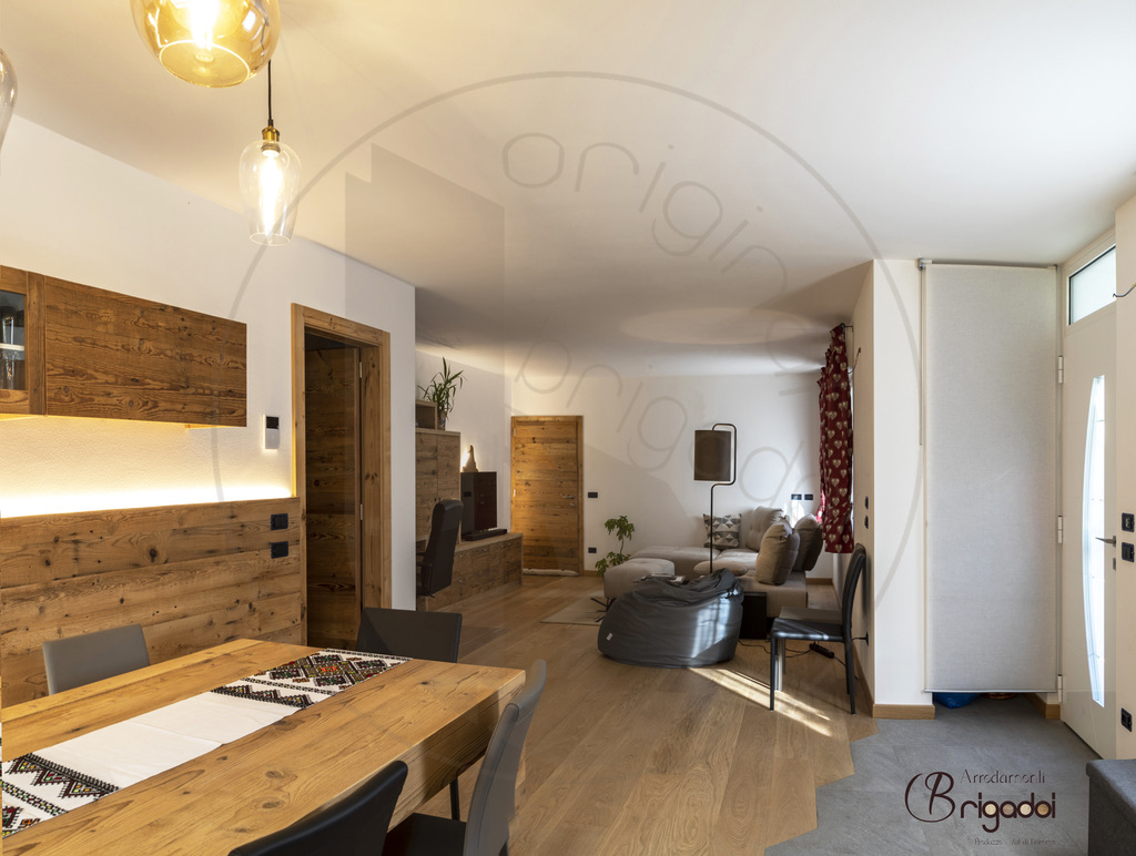 casa legno val di fiemme trentino interior design arredamento falegnameria soggiorno cucina dolomiti
