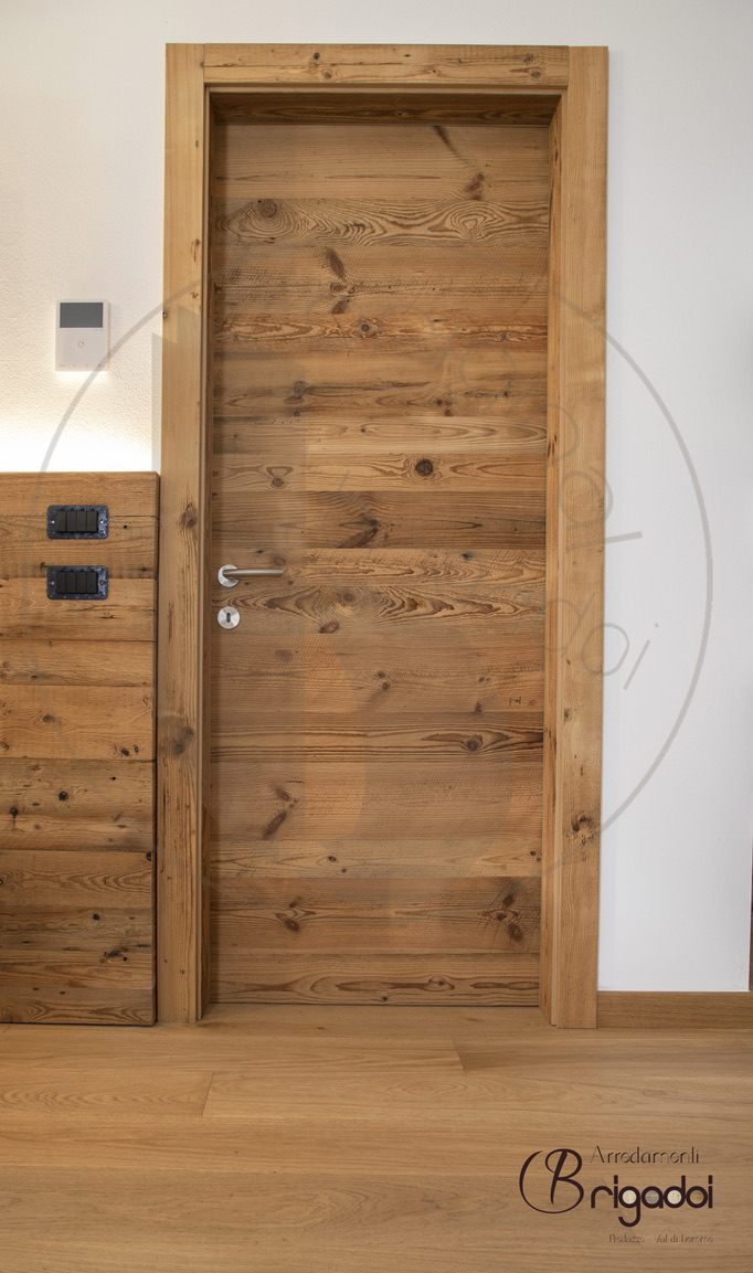 casa legno val di fiemme trentino interior design arredamento falegnameria soggiorno cucina dolomiti