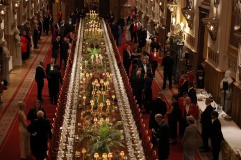 Phil Noble/REUTERS Guests arrive to attend the State Banquet during US President Donald Trump's state visit, at Windsor Castle, in Windsor, Britain, September 17, 2025.