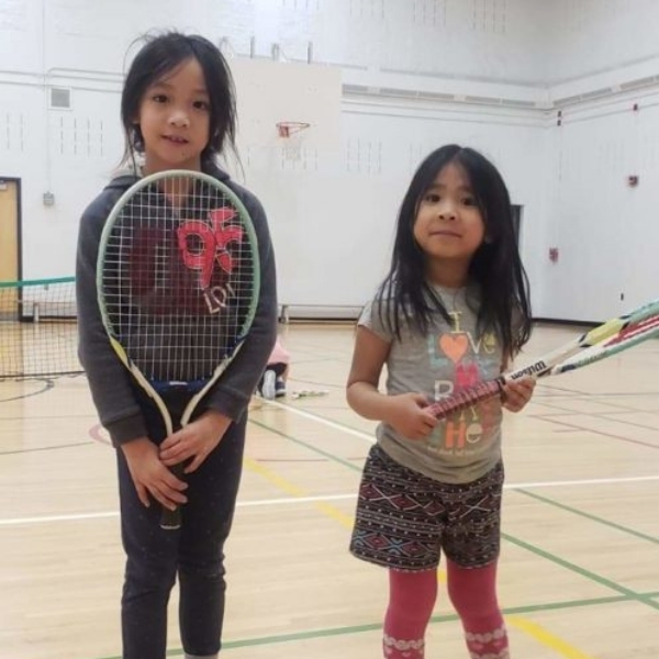 Maricar and Margaux having fun at First Serve Tennis lessons.