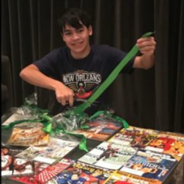 FANS co-founder, Benjamin, prepping our holiday gifts for our newcomers