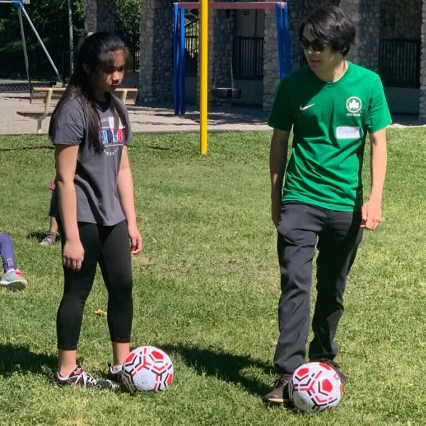 Kaycee and Benjamin at our summer soccer event