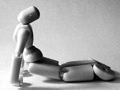 Stikfas Yoga: Beta female practices the Cobra Pose