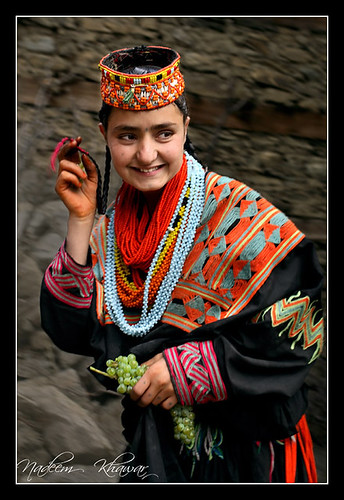 Kalasha. (people with black robe).