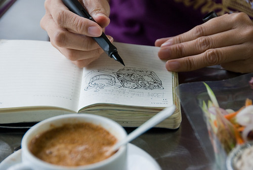 Liyin drawing her breakfast at BOH Tea Cafe