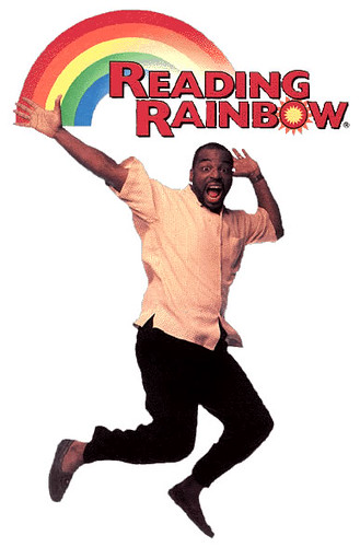 Reading Rainbow TV Show Host LeVar Burton Jumping With Logo