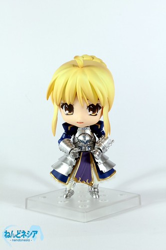 She looks shyly happy after getting her skirt restored