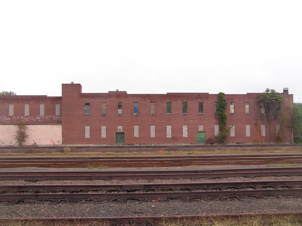 Large red building, with tracks