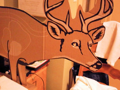 Printed side of cardboard deer shaped target with deer face