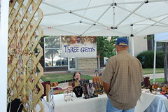 Three Gems on a beautiful Summer Saturday Our craft vendor tent with a customer