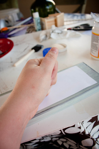 Really press and flatten out the print on the wet Mod Podge