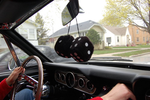 Dice are hanging from the rear view mirror