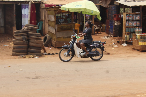 Iheaka Enugu Nigeria Female Motorcyclist. by Jujufilms