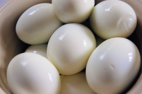 bowl of peeled boiled eggs