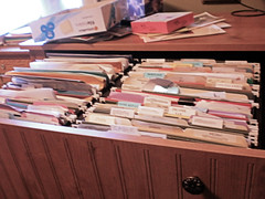 Top file drawer in my desk File drawer packed with files