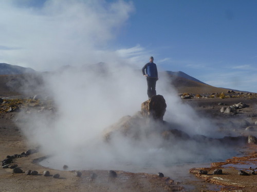 Warming up over a geyser in the Atacama Desert P1090501