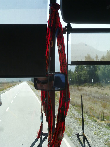 Our bus driver's red scarf offering to Gauchito Gil P1080843