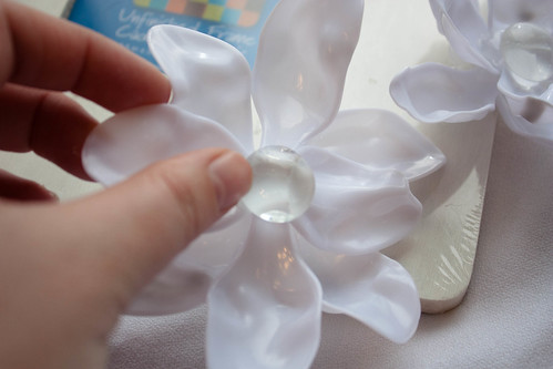 Glue a floral gem in the center of the flower