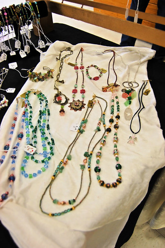 Beautiful necklaces on white crushed velvet 