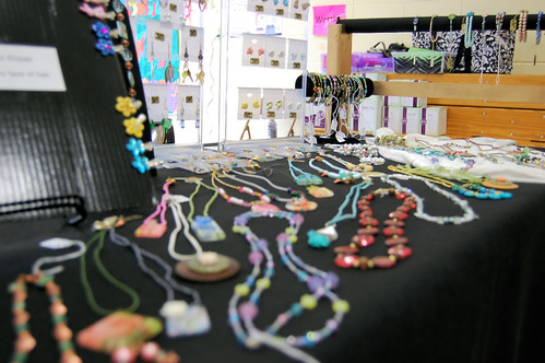 Display table with bead necklaces