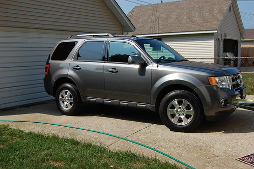 grey small SUV in driveway