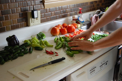 Mike's cutting board as he reaches for more peppers