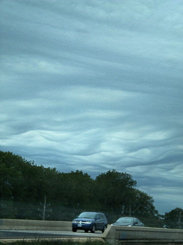 wavy clouds under the linear were waves of clouds