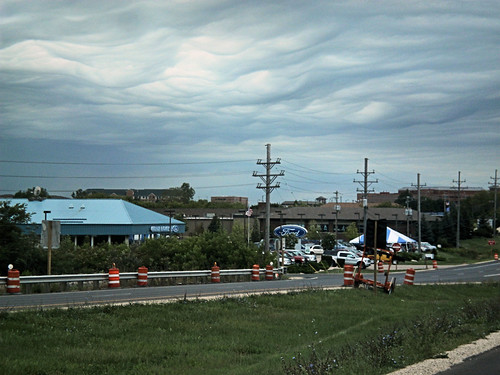 returning to the dealer as the clouds roll in clouds over the Ford dealer